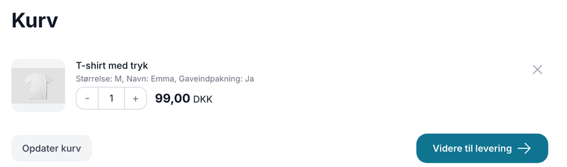 Kurv i webshoppen hvor varelinjen viser teksten Størrelse M, Navn Emma, Gaveindpakning Ja under produktnavnet